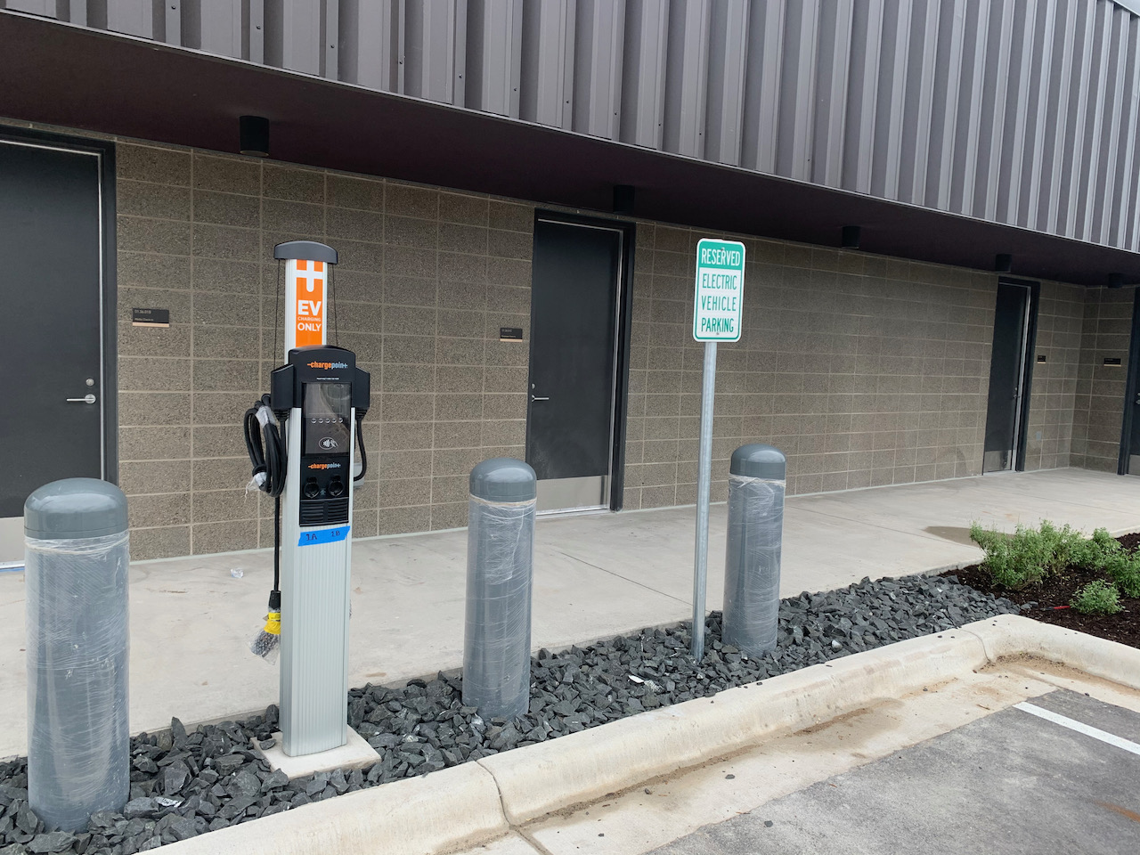 Electric vehicle charging at McKalla Place